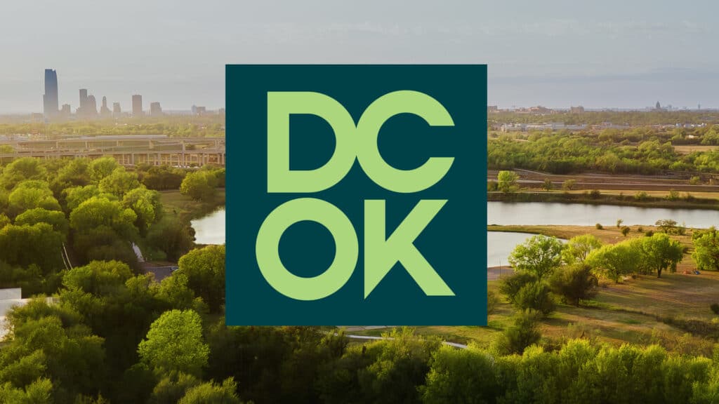 The Del City logo over a photograph of the municipal area.