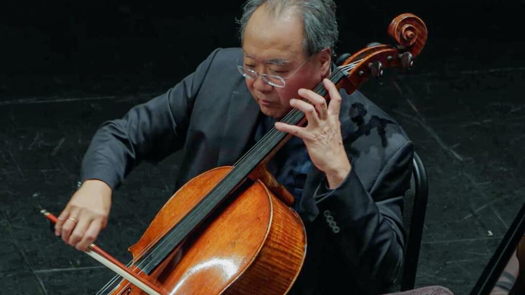 An Oklahoma cellist playing a concert.