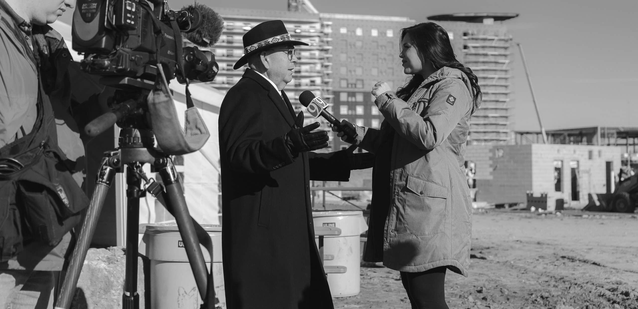 Chickasaw Nation Governor Anoatubby is interviewed by a reporter at the groundbreaking event for the OKANA Indoor Waterpark & Resort.