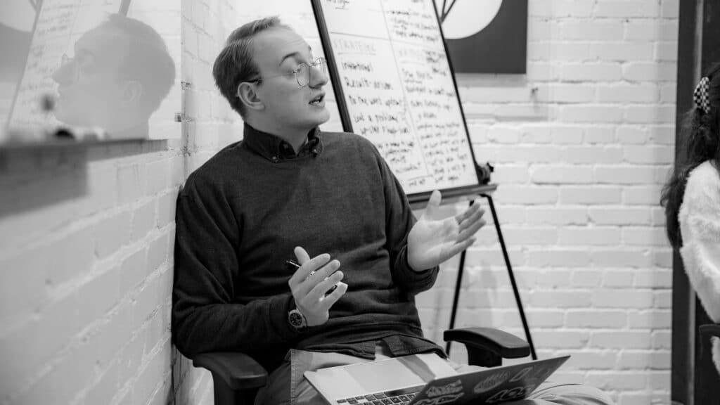 A Koch Comm brand strategist leads a client brainstorm.